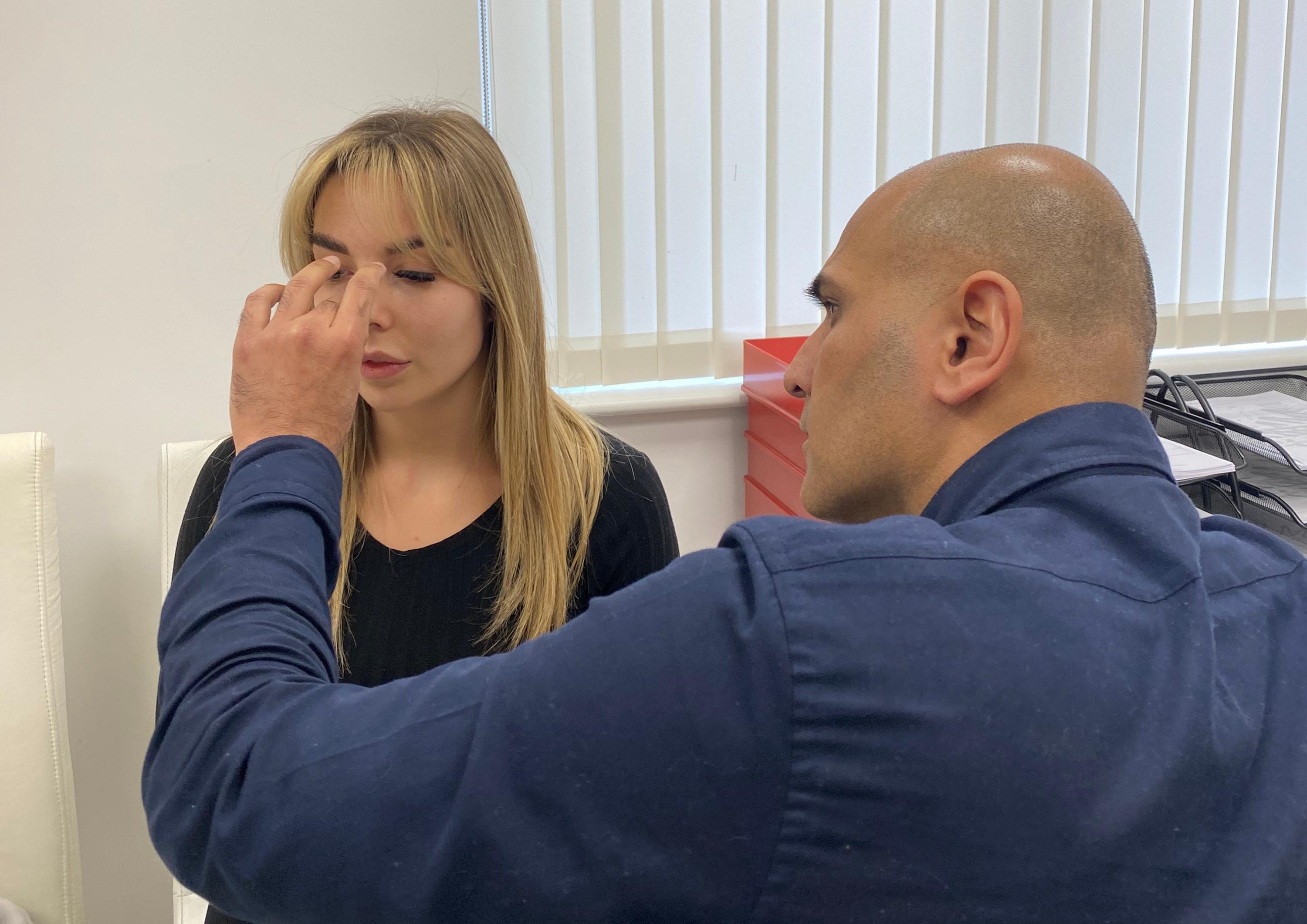 Mr Hussain and Amelia Goodman in consultation Mr Hussain and Amelia Goodman in consultation
